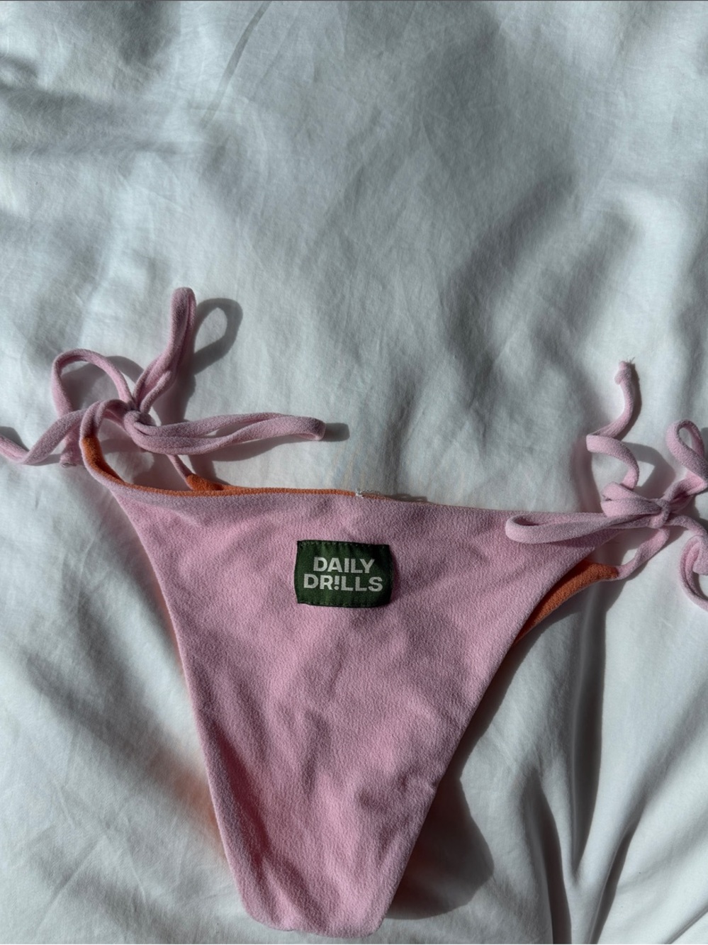 Daily Drills Pink and Orange Reversible Tie-Side Bikini Bottom - Picture 2 of 2